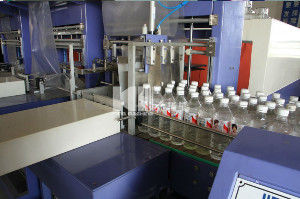 Semi-Automatic PE Film Shrink Packaging Equipment For Circular / Square Container