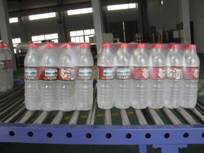 Semi-Auto Shrink Packaging Equipment 0.4stere/min For Bottled Water