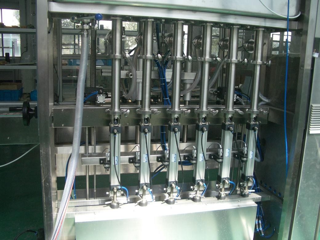 25 ~ 30 bpm Piston Filling Machine with 6 to 12 filling nozzles for Oil, Syrup & Detergent